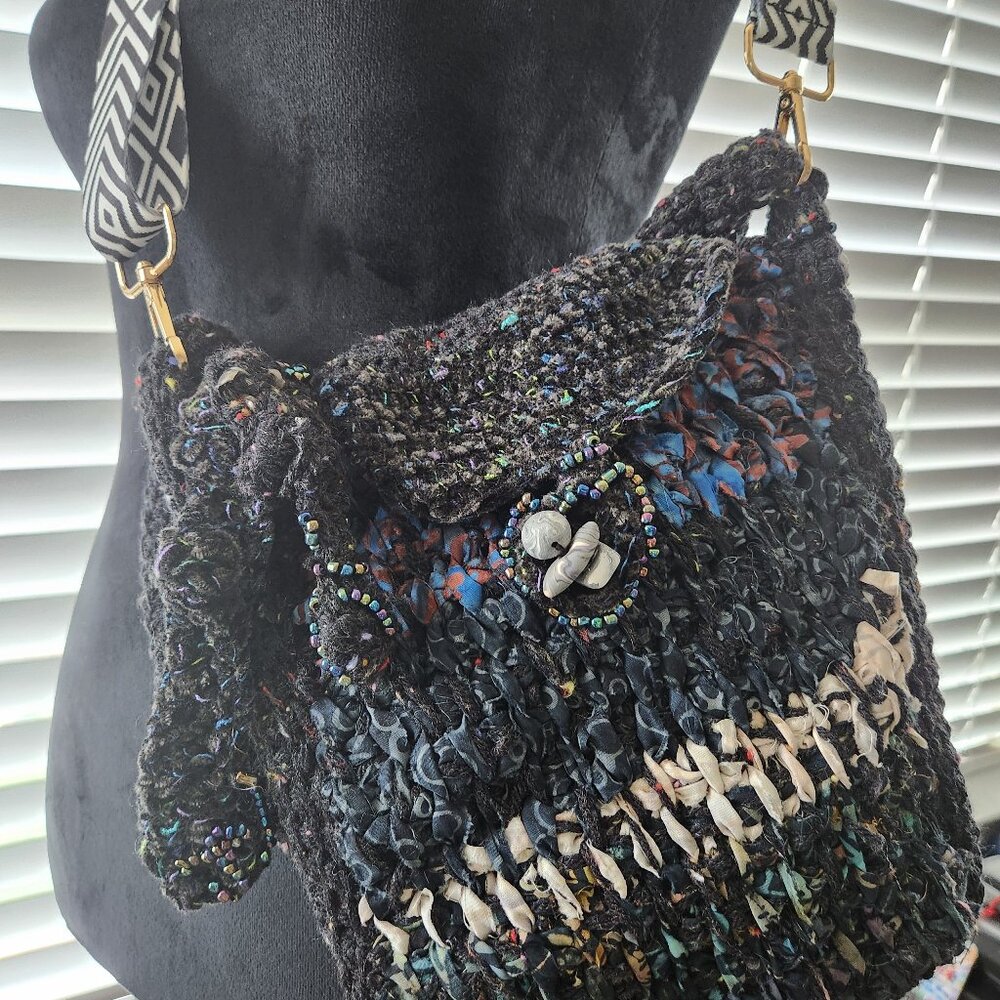 Purse, new, handmade, free form, crocheted. 11x10 with adjustable handles.
